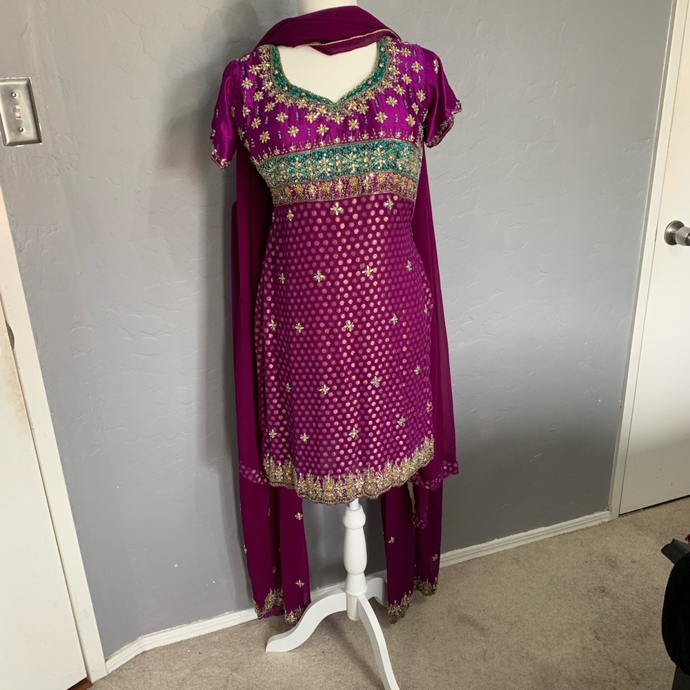 Beautiful magenta colored pakistani/ indian outfit